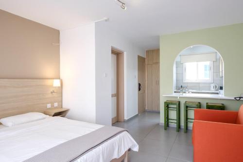 Ένα ή περισσότερα κρεβάτια σε δωμάτιο στο Pandream Hotel Apartments