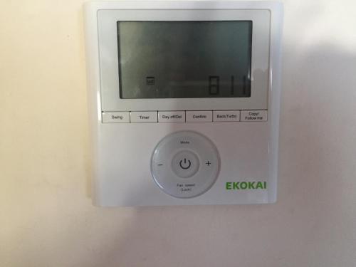 a white microwave with a tv on a wall at WONDERFUL APARTMENT IN CANET DE BERENGUER. VALENCIA in Valencia