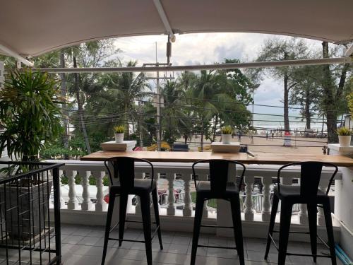 A balcony or terrace at Patong Marina Hotel by Lofty