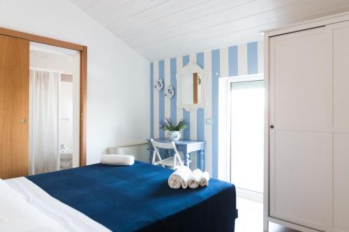 Ένα ή περισσότερα κρεβάτια σε δωμάτιο στο Hotel Jolie