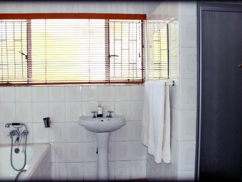 Ένα μπάνιο στο Aqua Terra Guest House