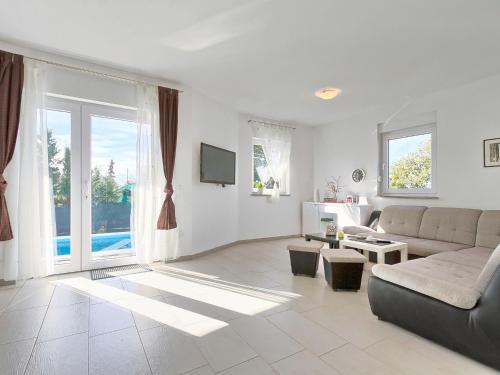 Et tv og/eller underholdning på Holiday Home Amber by Interhome