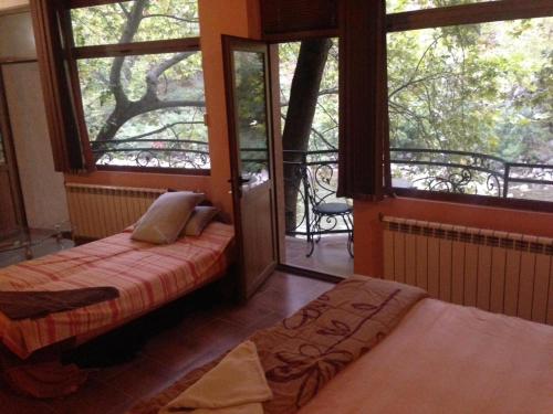 Postel nebo postele na pokoji v ubytování Hotel- Restaurant Struma