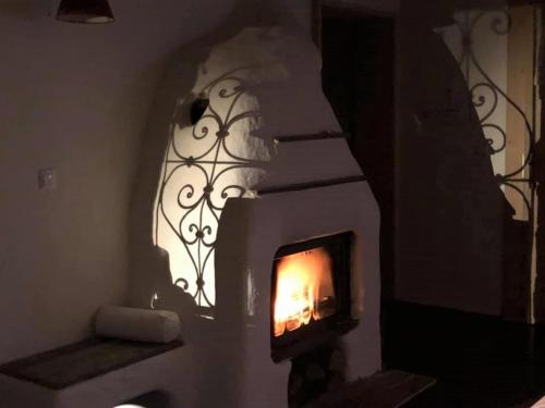 a shadow of a fireplace in a living room at Lavendowo in Piechowice