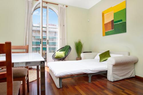 Llit o llits en una habitació de Stay U-nique Apartments Provença II