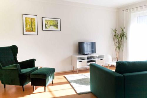 TV a/nebo společenská místnost v ubytování Ferienwohnung In der Altstadt