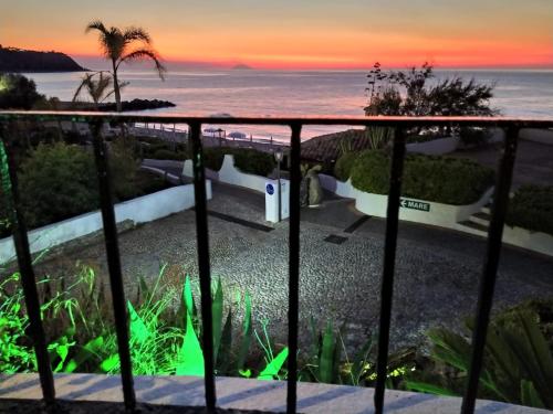 a view of the ocean from the balcony of a resort at Residenza Villa Spagnola in Parghelia
