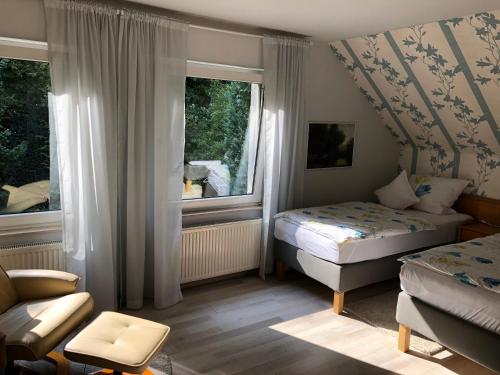 Кровать или кровати в номере Hotel Elfenberg