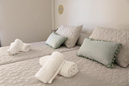 Posteľ alebo postele v izbe v ubytovaní Apartamentos Credencial