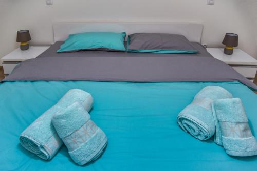 Krevet ili kreveti u jedinici u objektu Lux Apartment Flatiron Skopje
