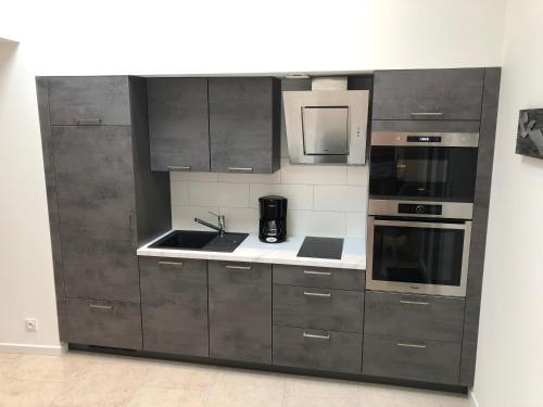 Dapur atau dapur kecil di Le grain de Sable