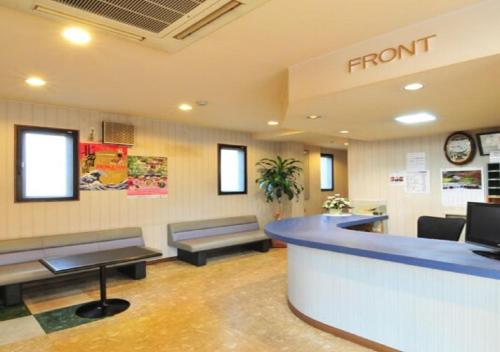 a waiting room with a front counter in a hospital at Omura - Hotel / Vacation STAY 46228 in Omura