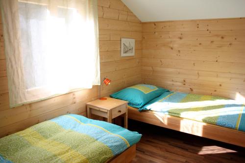 Ένα ή περισσότερα κρεβάτια σε δωμάτιο στο Chalet Samson