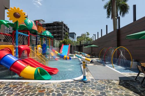 a playground with a water park with a water slide at Chuang-tang Spring Spa Hotel in Jiaoxi