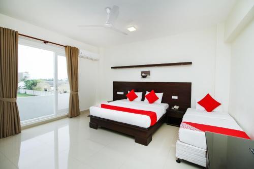 Ένα ή περισσότερα κρεβάτια σε δωμάτιο στο Hotel Nelly Marine