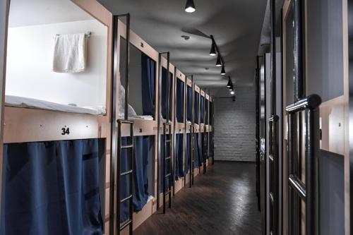 a row of stalls in a prison cell at Box Inn in Tver