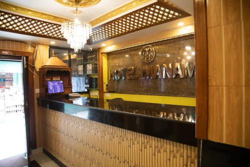 Лобби или стойка регистрации в OYO 304 Hotel Manama