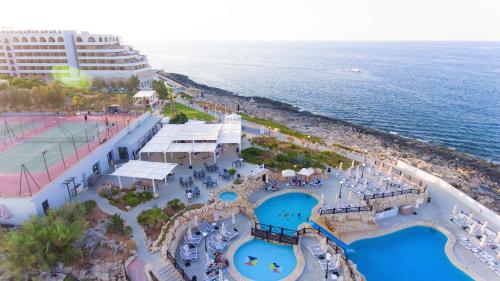 an aerial view of the resort and the ocean at Radisson Blu Resort, Malta St. Julian's in St Julian's