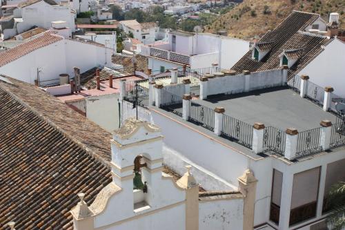 an aerial view of roofs of buildings at Hotel Don Pero in Alora