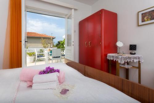 Postel nebo postele na pokoji v ubytování Aras Wind Rose