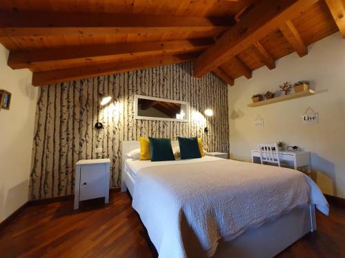 מיטה או מיטות בחדר ב-La Borasca - B&B