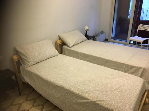 Postel nebo postele na pokoji v ubytování VegApartment