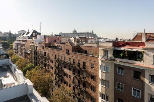 an aerial view of a city with buildings at Plaza de España Skyline in Madrid