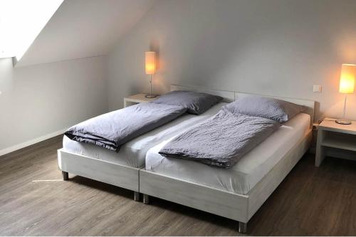 Ένα ή περισσότερα κρεβάτια σε δωμάτιο στο Haus Schönewald