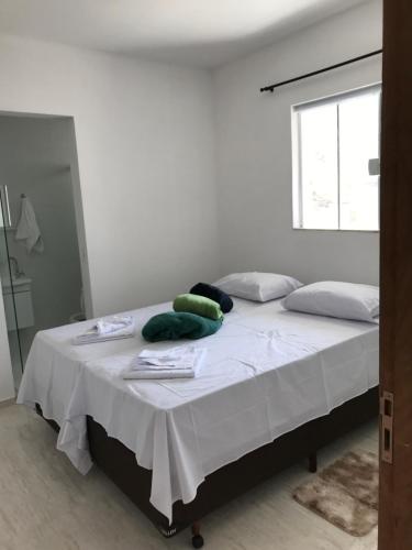 Ένα ή περισσότερα κρεβάτια σε δωμάτιο στο Pousada Anjos da Montanha