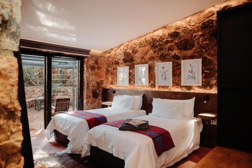 מיטה או מיטות בחדר ב-Bastion House