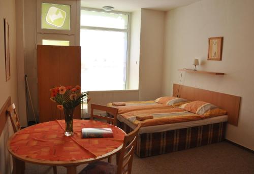 Hotel Děčínにあるベッド