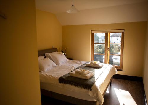 מיטה או מיטות בחדר ב-The Leaping Salmon