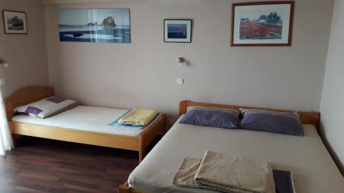 Postel nebo postele na pokoji v ubytování Apartments Svjeta