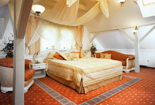 Posteľ alebo postele v izbe v ubytovaní Hotel Aleksander
