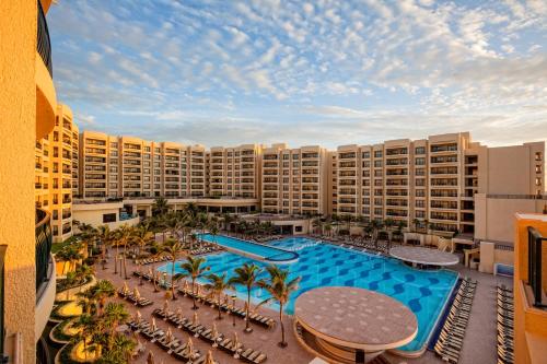 an aerial view of a resort with a swimming pool at The Royal Sands Resort & Spa in Canc&uacute;n