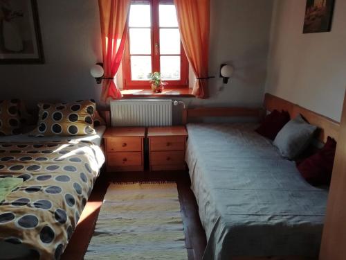 Postel nebo postele na pokoji v ubytování Apartmán Hořice na Šumavě