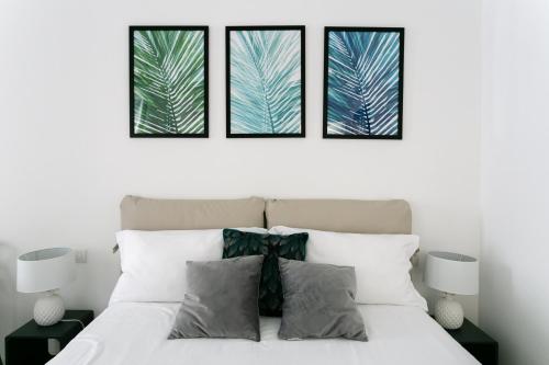 Posteľ alebo postele v izbe v ubytovaní Milanofierapartments