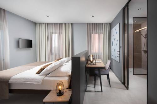 Postel nebo postele na pokoji v ubytování Terra Residence
