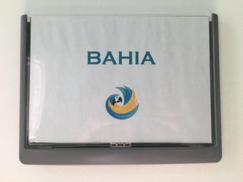 a book with the bahia logo on it at Le Bahia centre la Brèche wifi linge de pressing in Niort