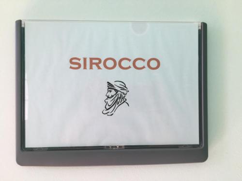 una pantalla de ordenador con el logotipo del siegnox en Le Sirocco centre la Brèche wifi linge de pressing, en Niort