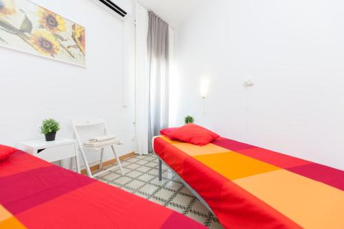 Кровать или кровати в номере Stay Barcelona Plaza España Fira