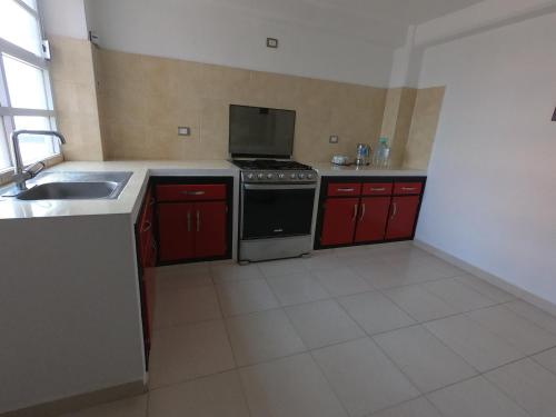 Una cocina o zona de cocina en Hotel Y Suites Axolotl