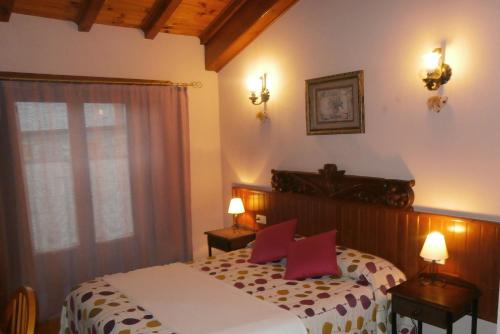 Ένα ή περισσότερα κρεβάτια σε δωμάτιο στο Cal Reus