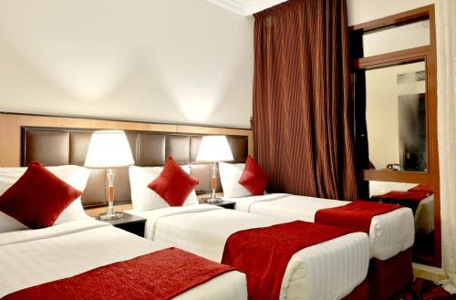Krevet ili kreveti u jedinici u objektu Hayah Al Waha Hotel