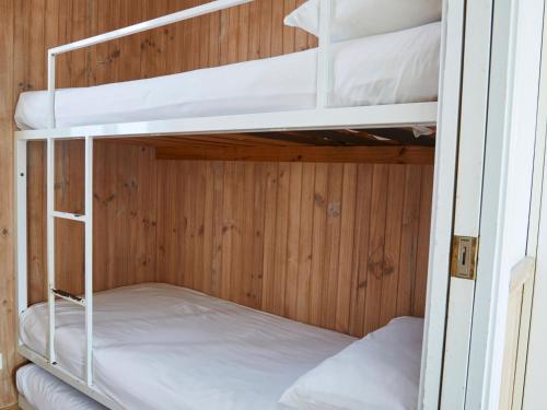 a couple of bunk beds in a room at Crescent Head Holiday Park in Crescent Head
