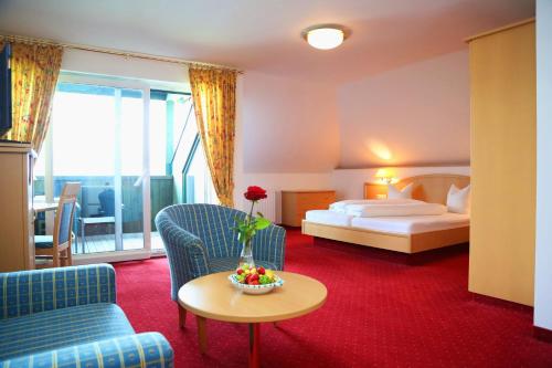 
Ein Bett oder Betten in einem Zimmer der Unterkunft Seegasthof Hotel Hois'n Wirt
