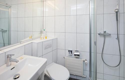 Kúpeľňa v ubytovaní Rigi Kaltbad Swiss Quality Hotel