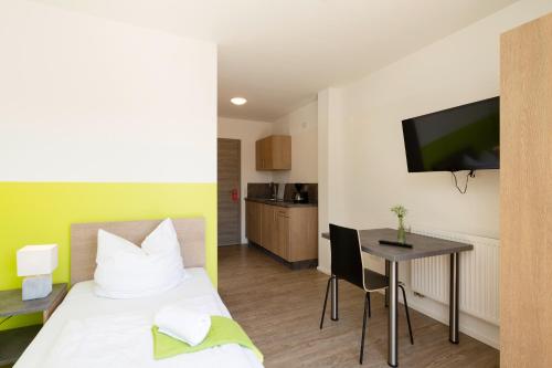 Μια τηλεόραση ή/και κέντρο ψυχαγωγίας στο Green Guest House