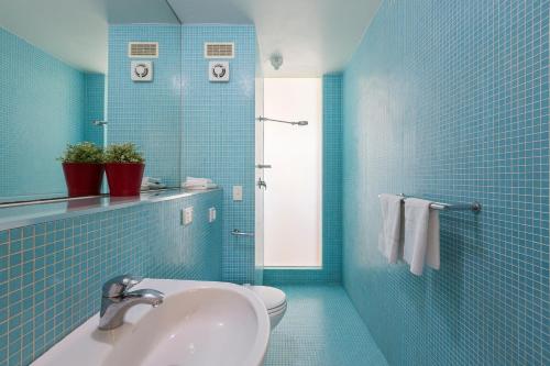 Ванная комната в Cottesloe Tree Top Studio