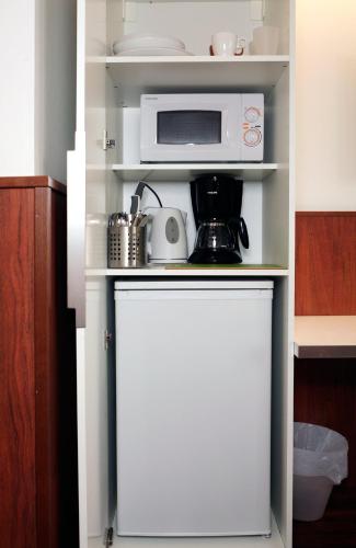 Una cocina o cocineta en Forenom Aparthotel Helsinki Kamppi - contactless check-in